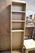 A laminate narrow shelf unit, height approx. 180cm