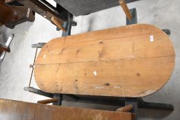 A large vintage wooden sled