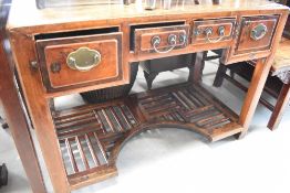 An Oriental hardwood desk or dressing table, width approx. 115cm