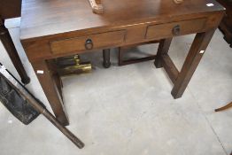 A modern hardwood console or side table, having two frieze drawers, width approx. 92cm