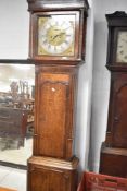 An 18th Century and later oak long cased clock having eight day movement with brass dial named for