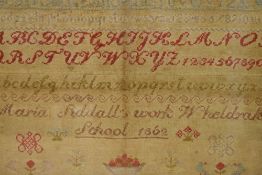 A Victorian needlework alphabet sampler, worked in polychrome threads by Maria Siddall, Wheldrake