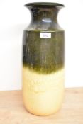 A West German Scheurich-Keramiik pottery vase with half mottled green and buff glaze, moulded