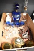 A retro cobalt blue glass decanter set with four glasses, a hunting themed decanter set with six