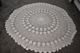 A circular cotton hand crocheted tablecloth 167cm diameter