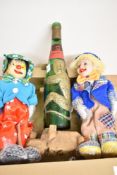Two collectable musical clown dolls in original boxes, a vintage green glass German Affentaler