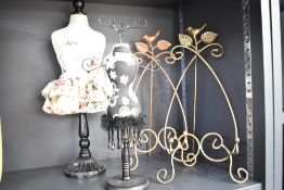 Two jewellery mannequin display stands and two brass effect picture stands