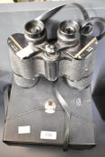 A pair of vintage Prinz 10x50 binoculars with carry case