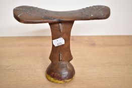 An African tribal wooden head rest with stud work decoration, h16.5cm