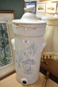 A late 19th / early 20th century stoneware water filter, having chrome tap and decorated with
