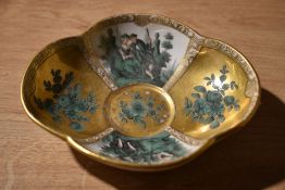 A Meissen scalloped dish having classical figural and floral design