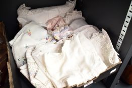 A small selection of vintage and antique soft goods, to include a satin sleeping cap/bonnet, child's