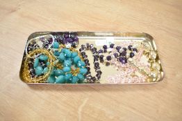 A collection of costume beaded bracelets, including quartz examples