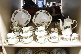 A Rosina fine bone china 'Yuletide' part dinner/tea service comprising thirty four pieces