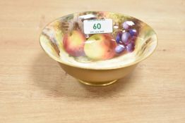 A Royal Worcester bowl, hand painted with fallen fruit against a mossy bank, signed F. Roberts,