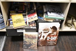 Two boxes containing various Military history books, to include The Animals' War, The Lancaster