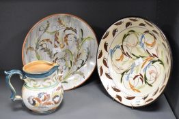 Glynn Colledge for Denby, a jug and two plates, each decorated with repeating foliate designs,