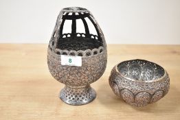 A metal censer having pierced shaped handle and decorated with floral and foliage patterns, h17cm