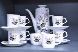 A 1960's J & G Meakin Studio coffee set, comprising coffee pot, six cups and saucers, sugar & cream,