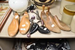 A group of three vintage shoe-trees.