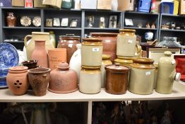 A large selection of stoneware and similar items to include eight salt-glazed jars, largest piece