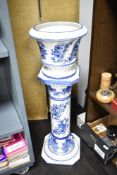 A blue and white capodimonte jardiniere on stand, h96cm
