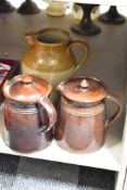 A large stoneware salt-glazed jug by Pearson's of Chesterfield measuring 26cm tall sold together