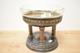A 20th century brass and glass centre piece in the Adams style, having a cut glass bowl supported on