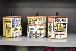 A 20th century ceramic coffee jar with wooden cover, h12.5cm, sold together with a sugar jar and tea