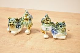 A pair of early 20th century Chinese Fu dog/lions, h9.5cm Condition report: Damaged