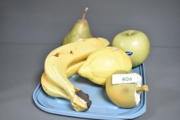 A group of ceramic fruit, to include banana, apple and pear, (5)