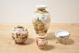 A small 20th Japanese Satsuma vase, decorated with Samurai and sold together with a similar globular