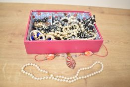 An assortment of costume jewellery including faux pearls, beaded jewellery and glass pieces