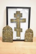 A brass and enamel Russian crucifix held behind a glass frame, h31cm, sold together with two
