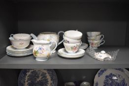 A Shelley Wild Flowers pattern tea set, comprising, teapot, seven cups, six saucers, six side