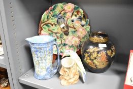 A ceramic plate decorated with birds and foliage, w30cm, sold together with a Chinese style ginger