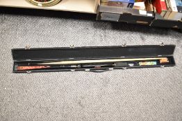 A E.J Riley 'John Higgins' three-piece snooker cue (including extension) with hard case and chalks