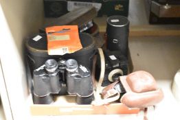 A vintage Kodak 'Colownap 35' camera, sold together with a pair of Boots Pacer binoculars, a