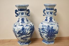 A pair of Chinese blue and white porcelain vase of baluster form, decorated with landscape scenes,
