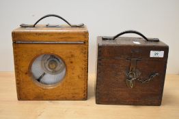 A Jackson & Pimlott pigeon racing clock with oak case, w18cm, sold together with a similar clock, (