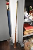 A cooper and brass coaching horn, of typical form 123cm high