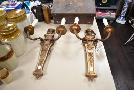 A pair of early Victorian gilt wood wall sconces, of French classical design having urn tops and de