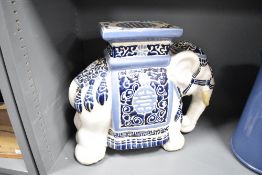 A ceramic plant pot stand in the form of an elephant, h39cm