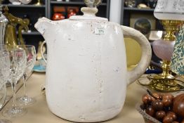 A large heavy studio pottery water jug/carrier or possible teapot, measures 30cm tall.