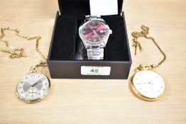 A boxed Amadeus wristwatch, the red dial having Roman and baton numerals on a bracelet strap,