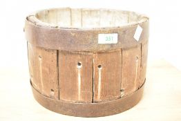 An antique coopered cheese press form, with drainage holes 18cm x 27cm