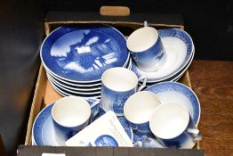 A group of blue and white Royal Copenhagen porcelain 'Christmas Day' plates and saucers, decorated