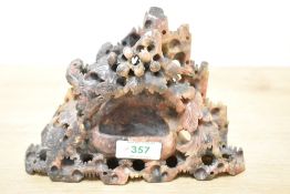A hand carved Chinese soap stone sculpture