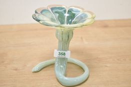 An attractive hand-blown green art glass flower form vase, with flower head aperture, the stem