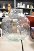 A large and decorative glass octagon-shaped jar, measures 36cm tall.